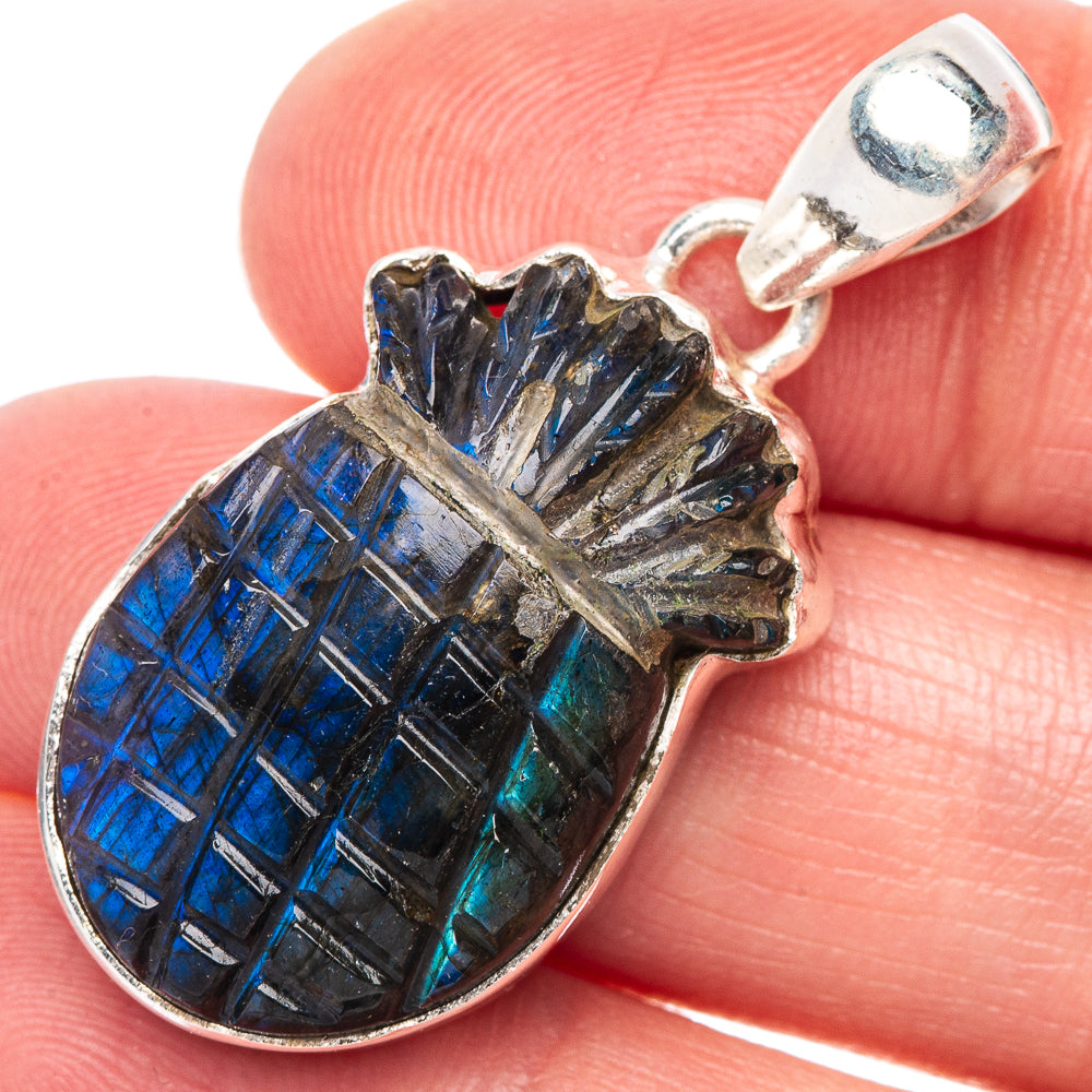 Carved labradorite pineapple pendant in 925 sterling silver, close-up of blue play-of-color