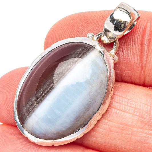 Owyhee opal pendant close-up, .925 sterling silver oval light-blue stone bezel