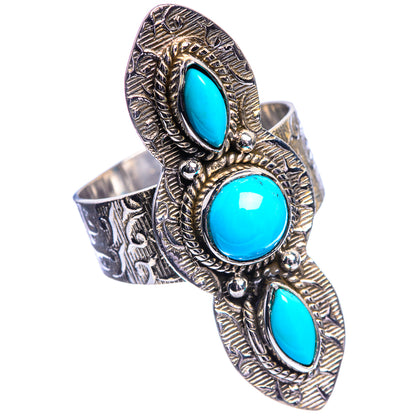 Ornate sterling silver turquoise ring with three oval cabochon settings, open band