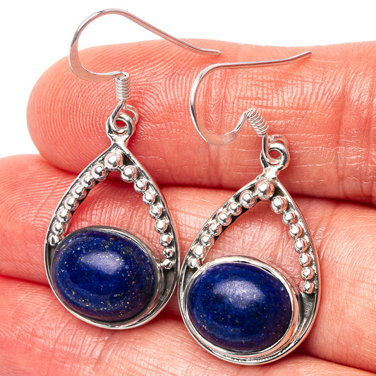 Lapis lazuli teardrop earrings in .925 sterling silver with textured border and hooks