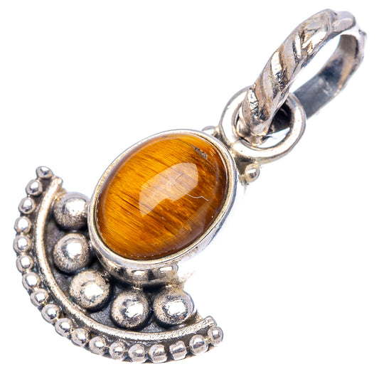 Oval tiger's eye sterling silver pendant with beaded halo border and loop bail.