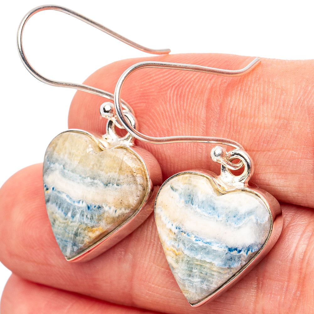 Sterling silver heart earrings with blue scheelite stone, dangle hooks