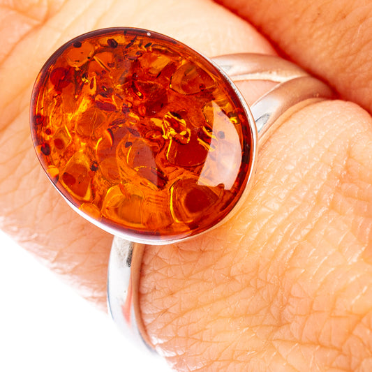 Amber cabochon ring with .925 sterling silver band, size 7, adjustable