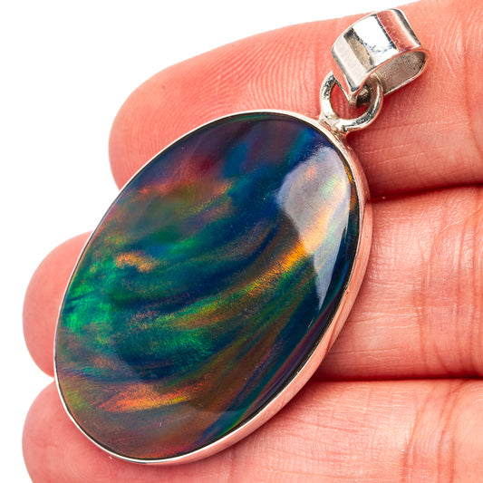 Oval opal pendant in .925 sterling silver, rainbow iridescent stone on bail