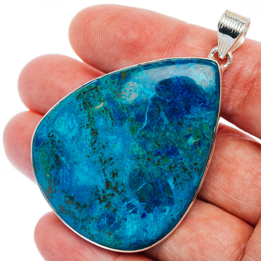 Blue shattuckite teardrop pendant with sterling silver bail and bezel setting