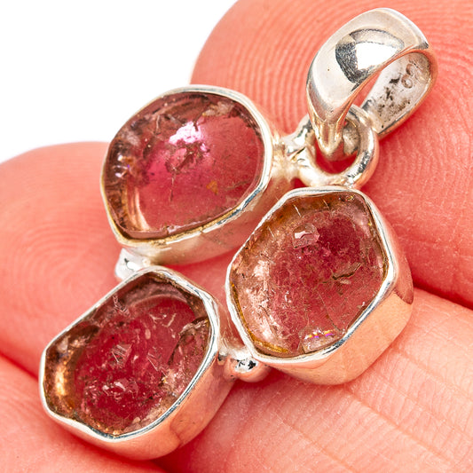 Sterling silver pendant with three faceted pink tourmaline stones, top bail visible