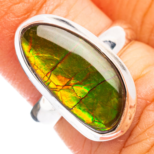 Oval green ammolite set in polished .925 sterling silver ring, size 5