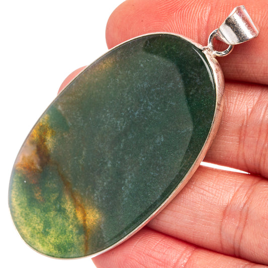 Green aventurine oval pendant with silver-plated bail, glossy dark green stone