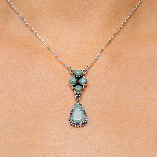 Sterling silver turquoise pendant necklace with teardrop charm and blue-green stones