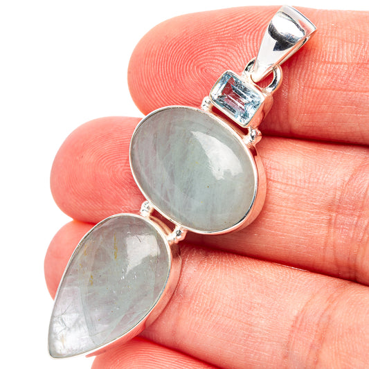 Oval light-blue gemstone pendant in .925 sterling silver, two-stone teardrop drop