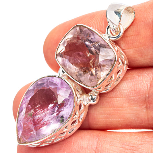 Faceted amethyst pendant with two oval stones in .925 sterling silver setting