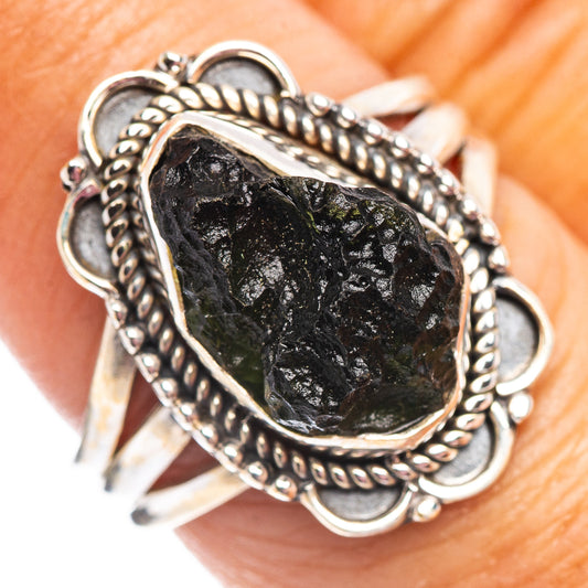 Size 7.5 sterling silver moldavite ring with dark teardrop stone and braided rope bezel