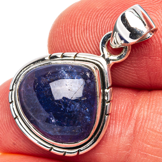 Sterling silver oval tanzanite pendant with hinged bail and faceted gemstone