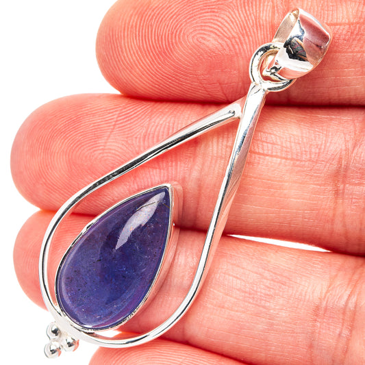 Sterling silver teardrop pendant with deep purple tanzanite-style gemstone, bail loop