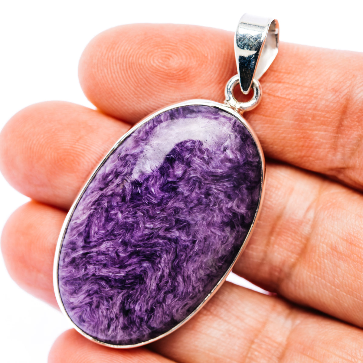 Sterling silver teardrop charoite pendant with purple marbled stone and silver frame