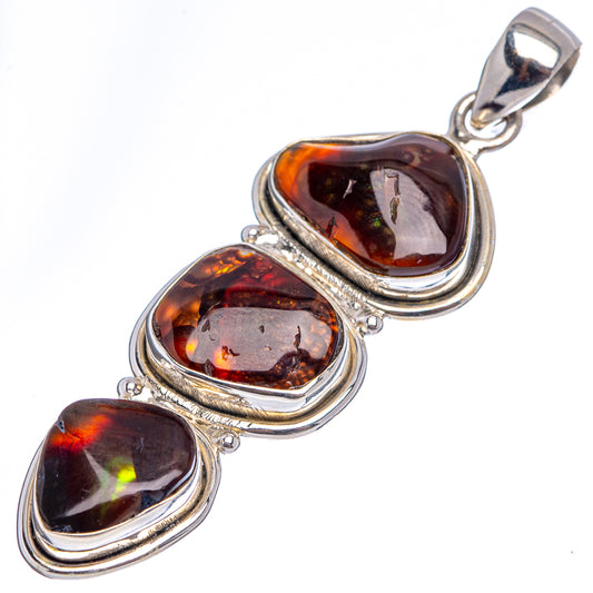 Sterling silver fire agate pendant with three oval dark amber stones in layered bezels