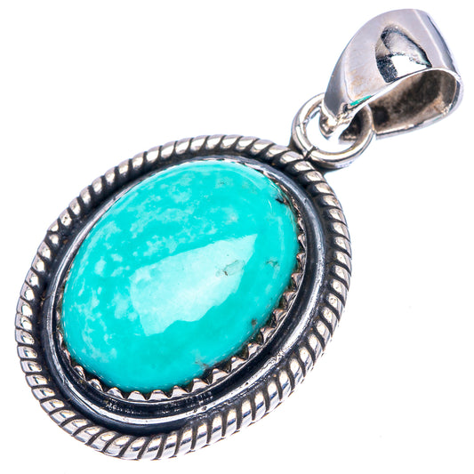 Oval turquoise cabochon pendant with sterling silver bail and rope-edged frame