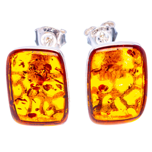 Square amber stud earrings with silver posts, warm honey amber in glossy bezel