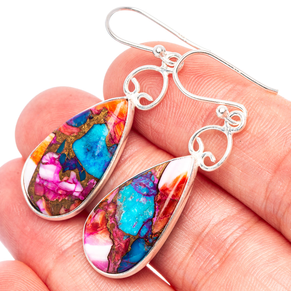 Sterling silver drop earrings with pink, turquoise, and gold marbled teardrop stones