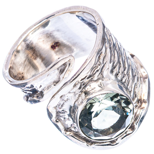 Adjustable .925 sterling silver ring with openwork band and round green gemstone bezel