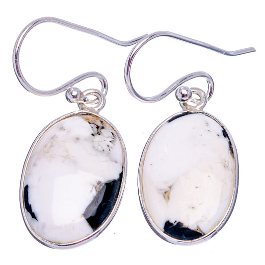 Pair of oval white turquoise cabochon drop earrings on .925 sterling silver hooks