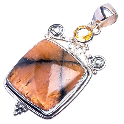 Sterling silver pendant showing chiastolite square frame with round citrine at top