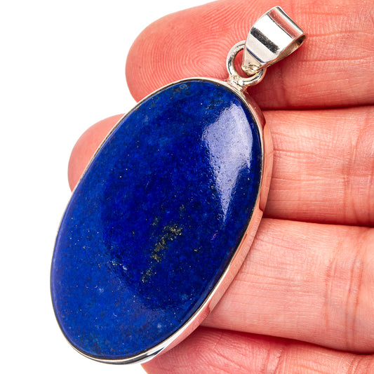 Lapis lazuli pendant with oval blue stone in .925 sterling silver bezel