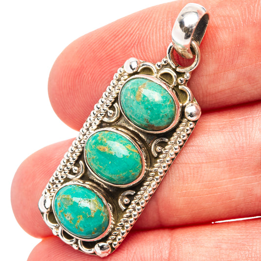 Sterling silver turquoise pendant with three oval stones in ornate bezel setting