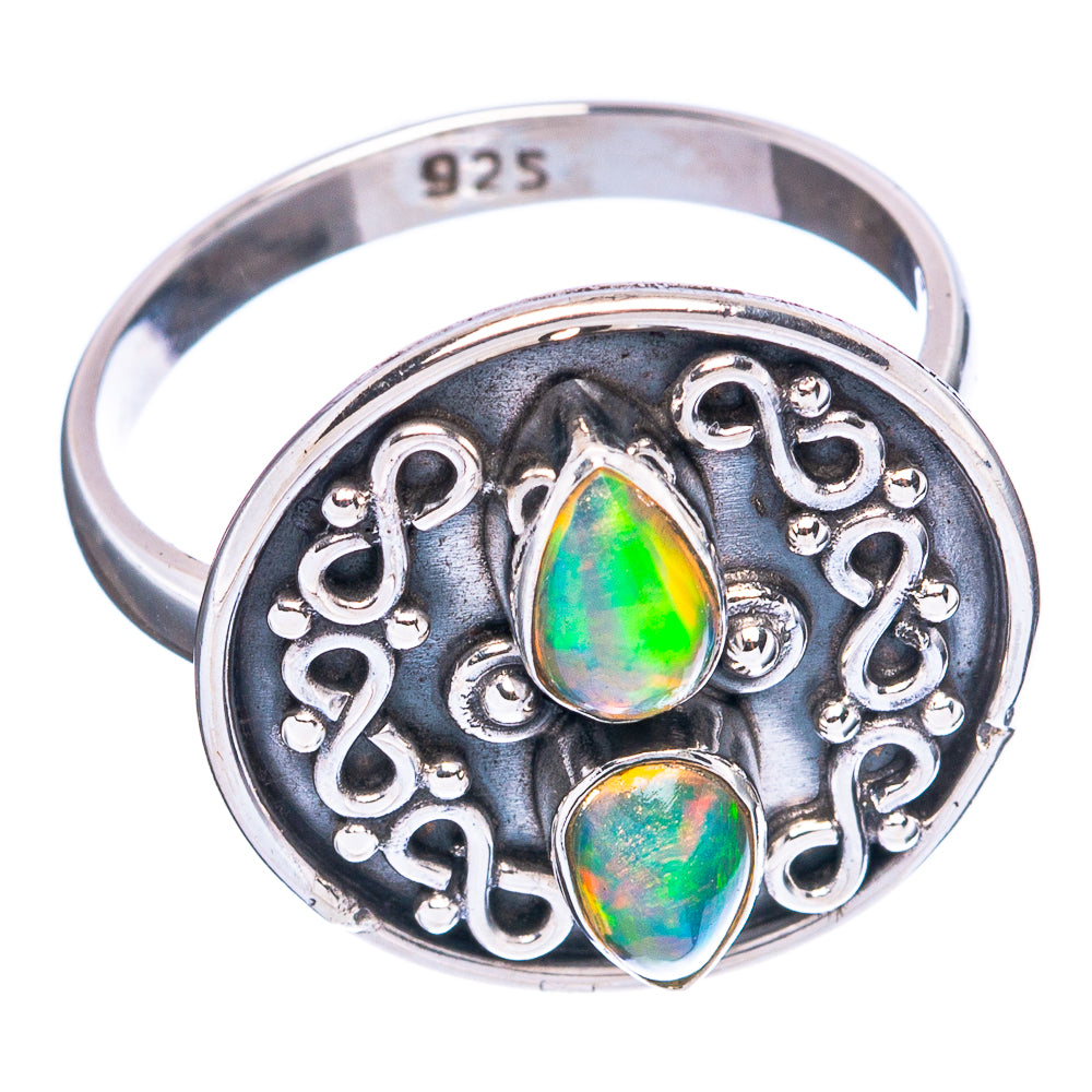 Sterling silver opal ring, stamped 925, featuring central oval Ethiopian opal cabochons