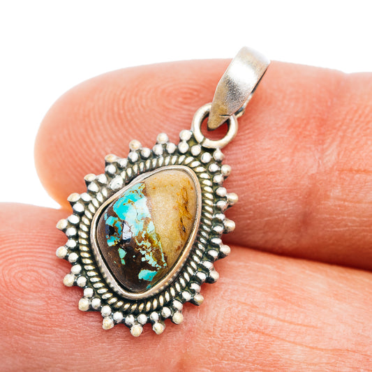 Turquoise oval pendant in .925 sterling silver with beaded frame and bail