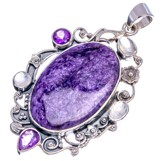 Oval purple charoite pendant in ornate .925 sterling silver with moonstone and amethyst stones