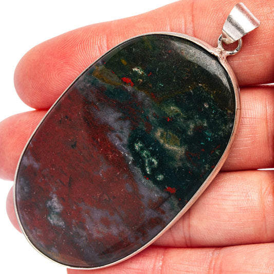 Silver-plated oval bloodstone pendant with dark green stone, red speckles, and gray patches