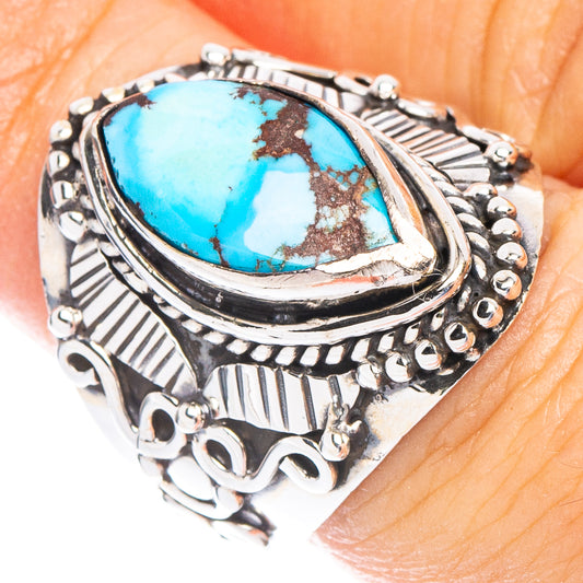 Turquoise oval stone set in ornate 925 sterling silver ring