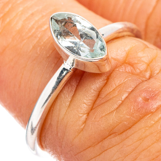 Aquamarine oval bezel ring in 925 sterling silver, size 6, on finger