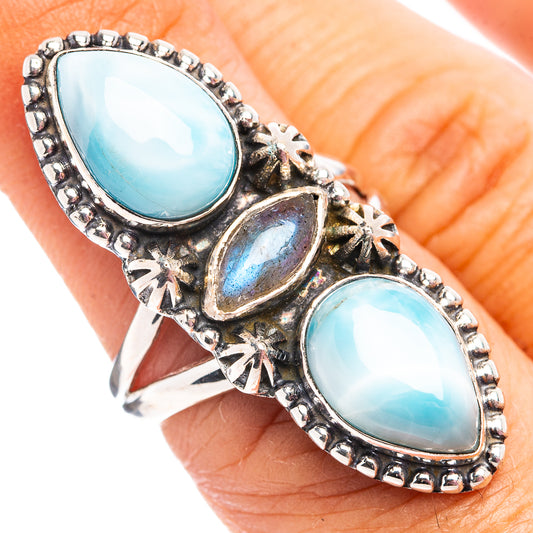Larimar and sterling silver ring with three oval blue stones and ornate bezel setting