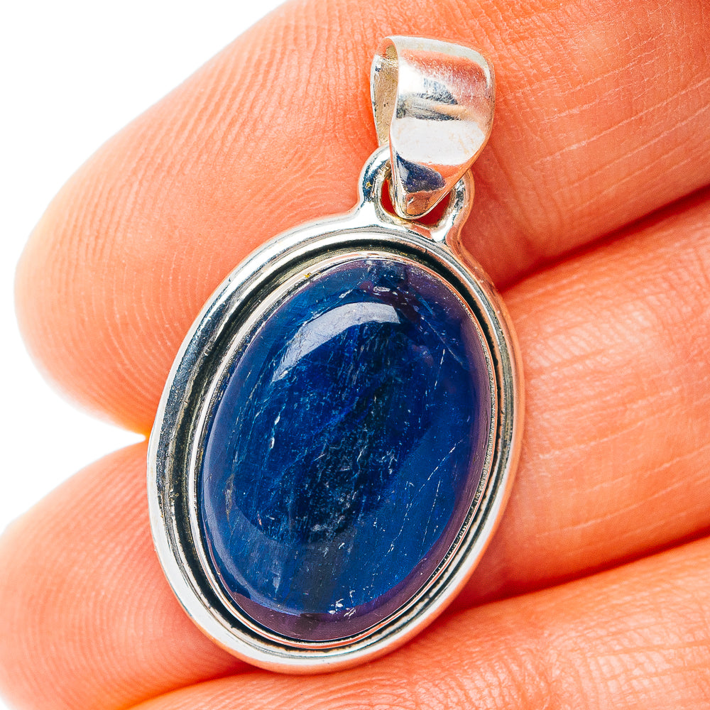 Oval sterling silver kyanite pendant with blue gemstone cabochon and top bail