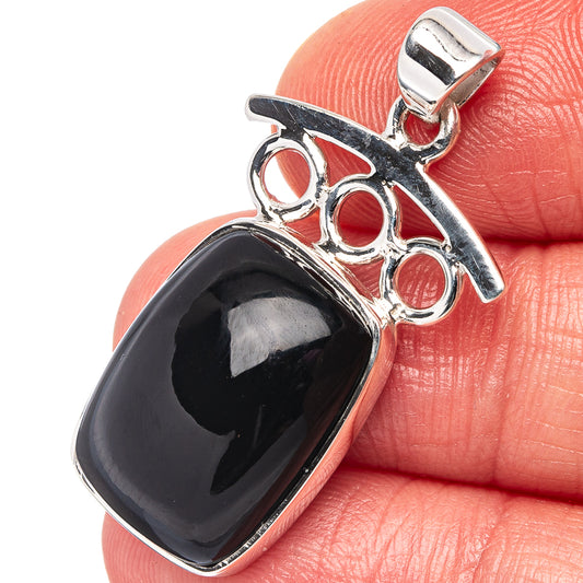 Black onyx oval pendant with .925 sterling silver bezel and bail detail