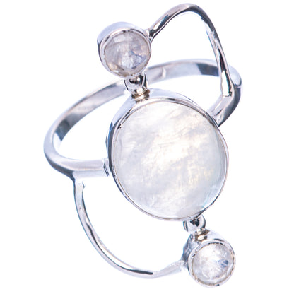 Silver moonstone ring, oval center with three round accents and open band