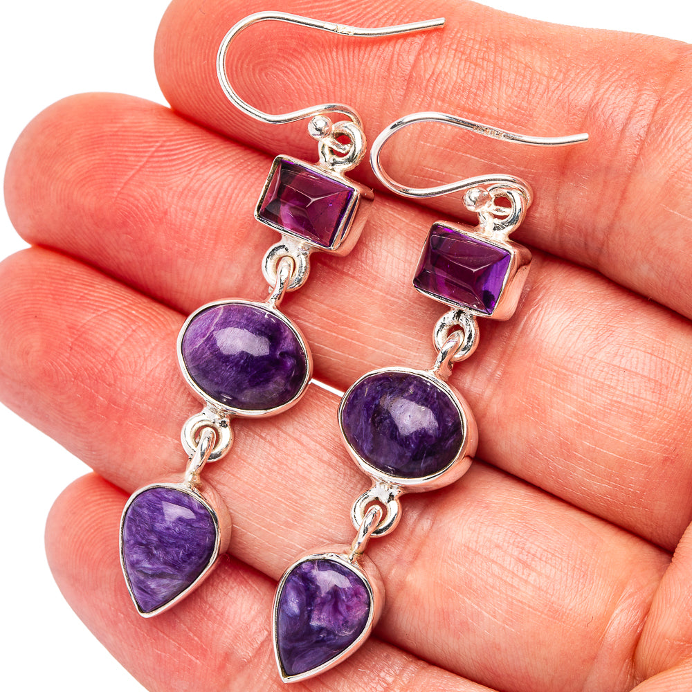 Purple gemstone dangle earrings with sterling silver hooks and faceted drops