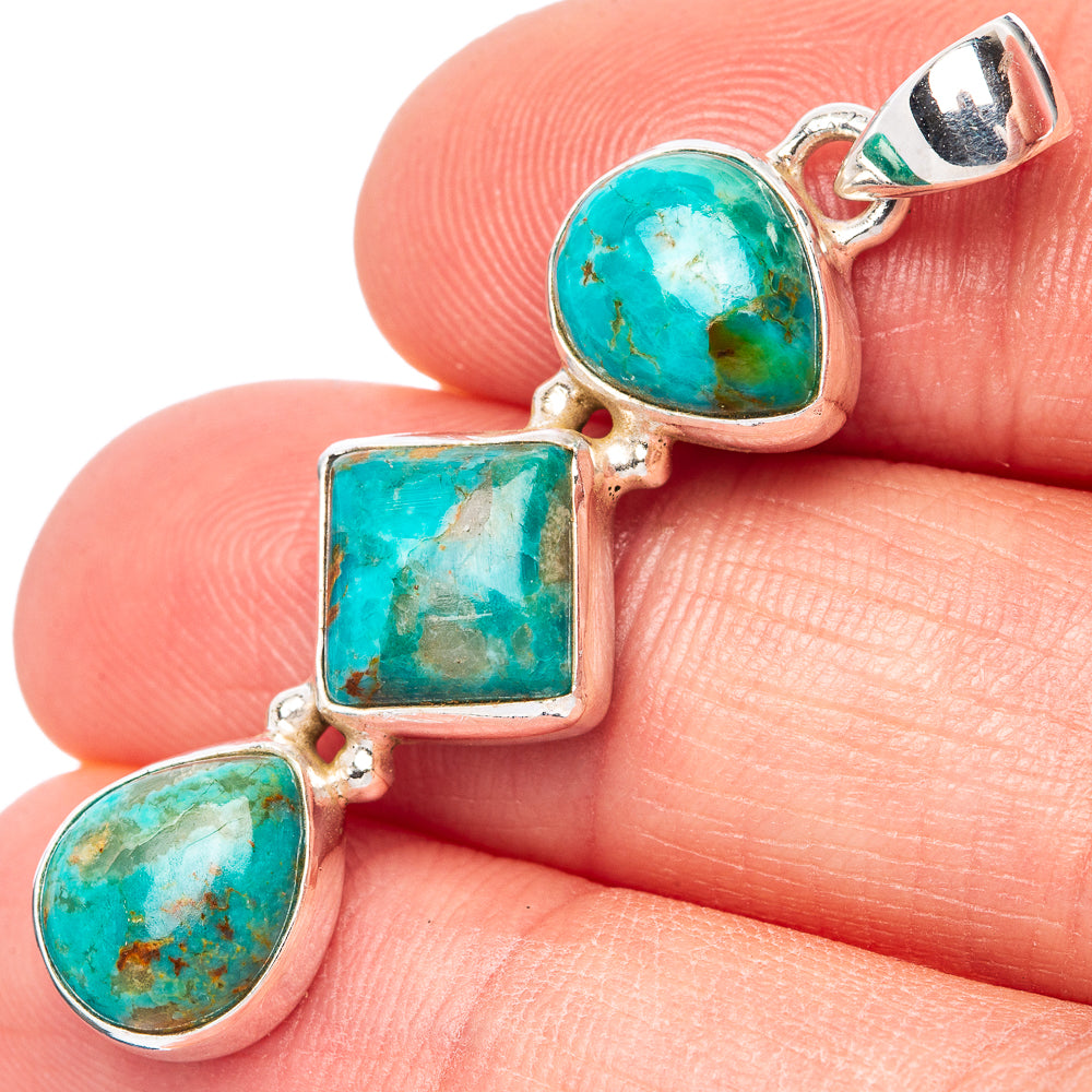 Turquoise pendant with three bezel-set stones in sterling silver, round and square links