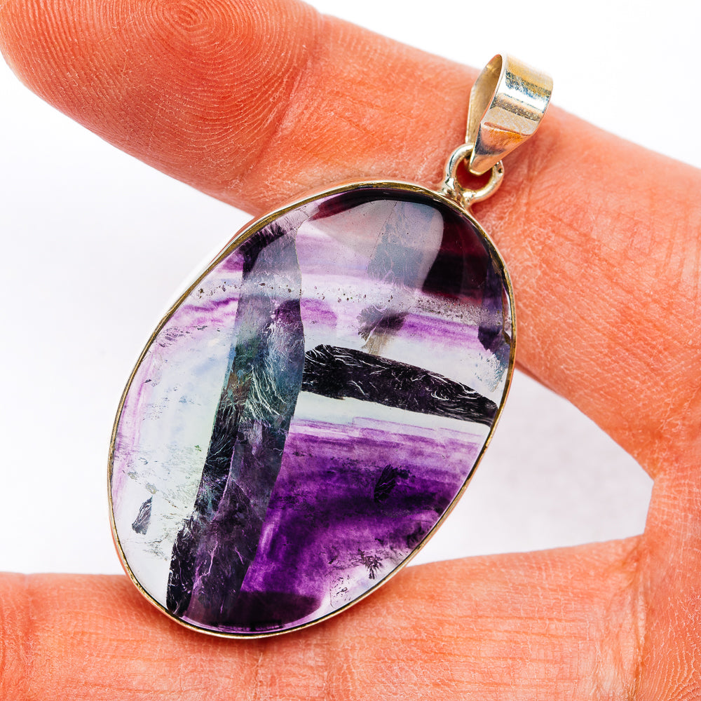 Oval purple fluorite pendant with .925 sterling silver bezel and small loop bail