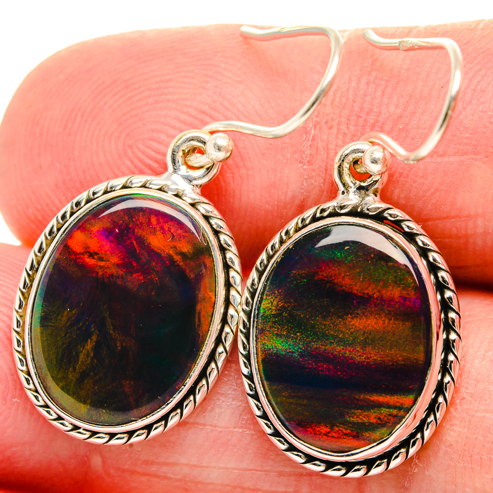 Sterling silver oval opal hook earrings with iridescent red-green stone