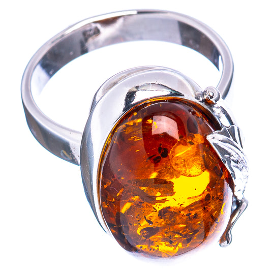 Oval Baltic amber cabochon set in .925 sterling silver leaf ring