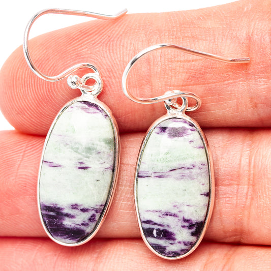 Oval purple-and-green stone insets on .925 sterling silver teardrop earrings