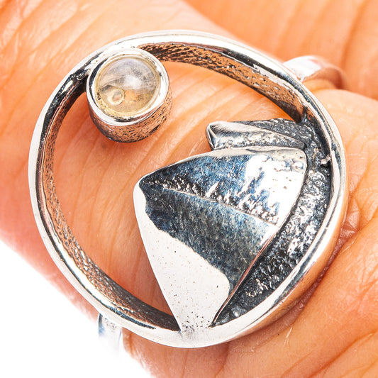 Dainty .925 sterling silver moonstone ring with oval cabochon and mountain design