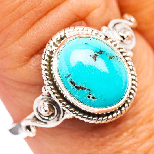 Size 10 .925 sterling silver ring with oval turquoise cabochon and rope bezel