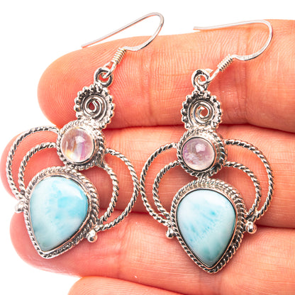Sterling silver drop earrings with pink and blue teardrop stones and ornate hoops