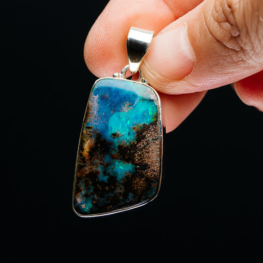 Sterling silver opal pendant bail with teardrop blue-teal boulder opal cabochon