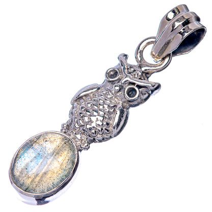 925 sterling silver pendant with oval labradorite, textured sculpted animal charm, top bail