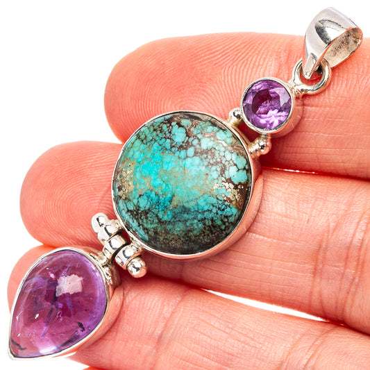 Oval turquoise and amethyst pendant in sterling silver, close-up view with silver loops